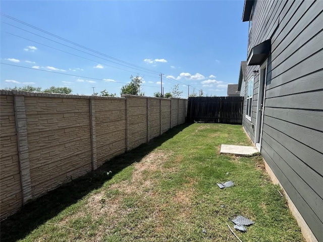 393 Soapstone Pass, Maxwell, TX 78656 - view of fenced backyard