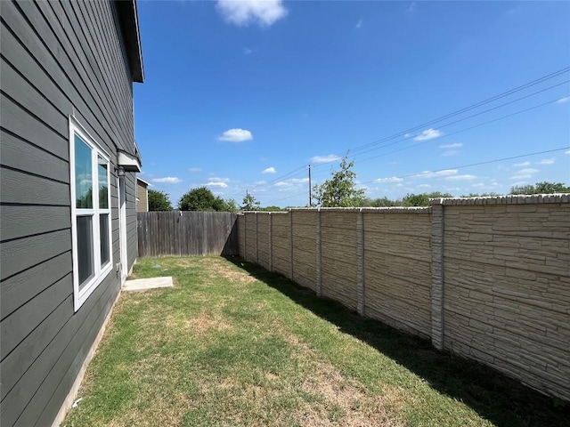 393 Soapstone Pass, Maxwell, TX 78656 - view of fenced backyard