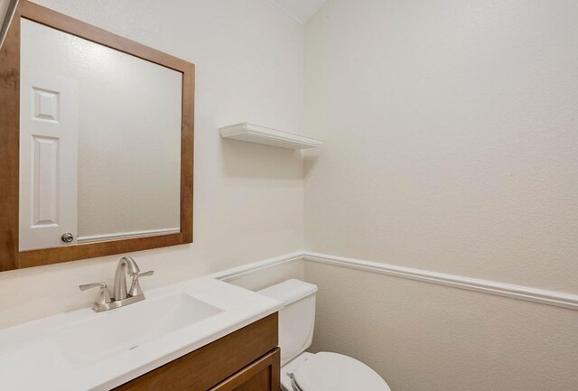 19709 Vilamoura St, Pflugerville, TX 78660 - half bath featuring vanity and toilet