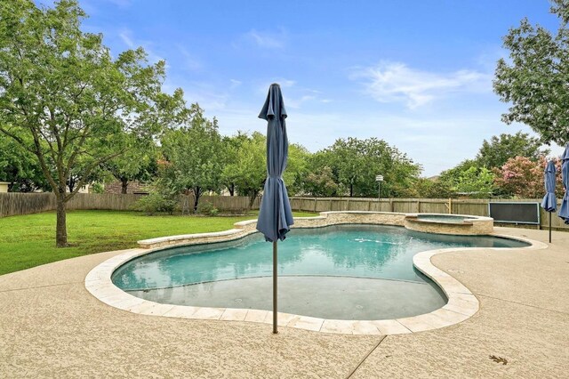 19709 Vilamoura St, Pflugerville, TX 78660 - view of swimming pool with a fenced backyard, a pool with connected hot tub, and a patio area