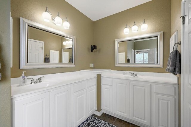 19709 Vilamoura St, Pflugerville, TX 78660 - bathroom with tile patterned floors and vanity