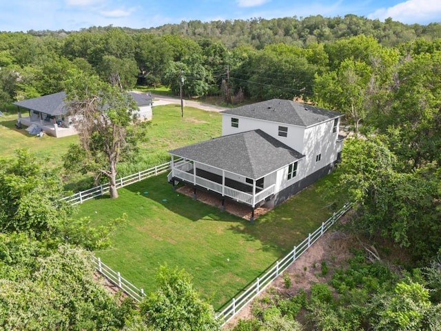 147 Kahana Ln, Bastrop, TX 78602 - view of subject property with a heavily wooded area