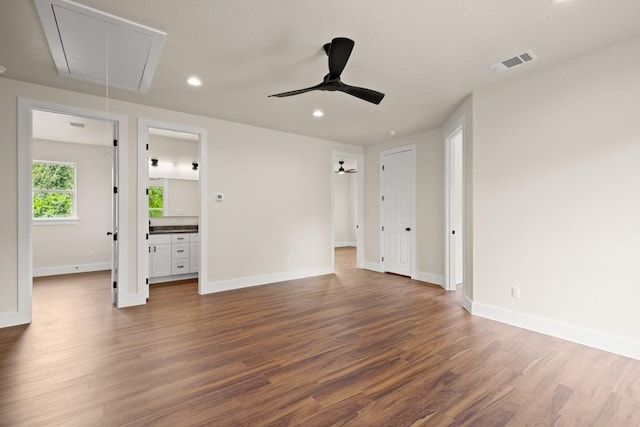 147 Kahana Ln, Bastrop, TX 78602 - unfurnished room with attic access, recessed lighting, dark wood-style flooring, and ceiling fan