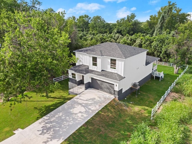 147 Kahana Ln, Bastrop, TX 78602 - view from above of property with a forest