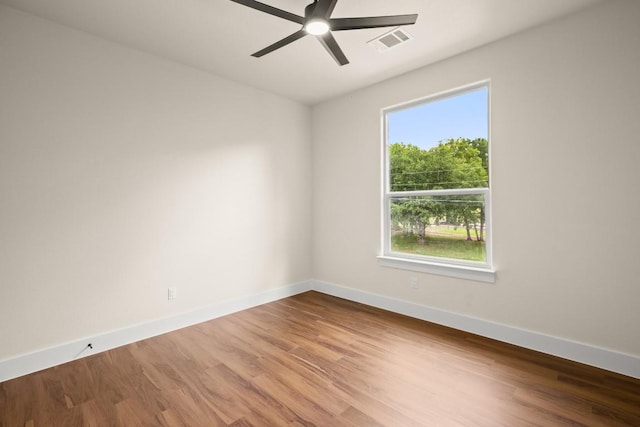 147 Kahana Ln, Bastrop, TX 78602 - empty room featuring wood finished floors and a ceiling fan