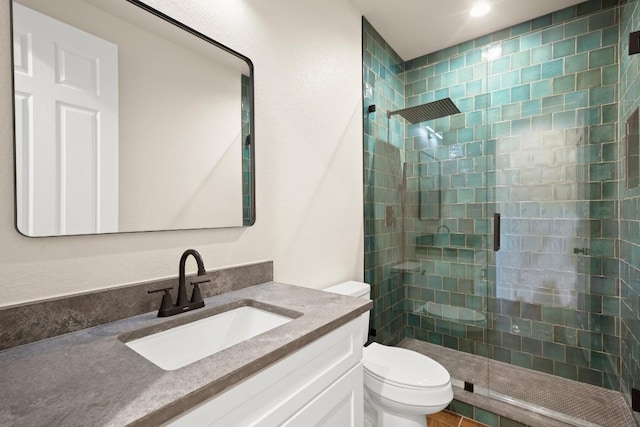 147 Kahana Ln, Bastrop, TX 78602 - bathroom with a tile shower, vanity, and recessed lighting