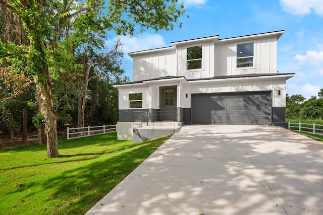 147 Kahana Ln, Bastrop, TX 78602 - modern farmhouse with an attached garage, driveway, and board and batten siding