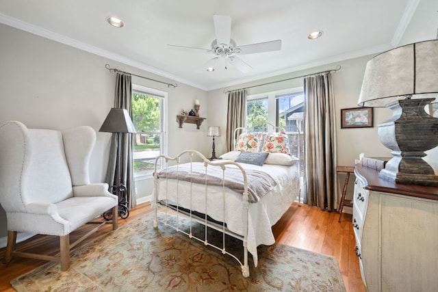 1807 Cullen Ave, Austin, TX 78757 - bedroom with light wood finished floors, crown molding, recessed lighting, and a ceiling fan