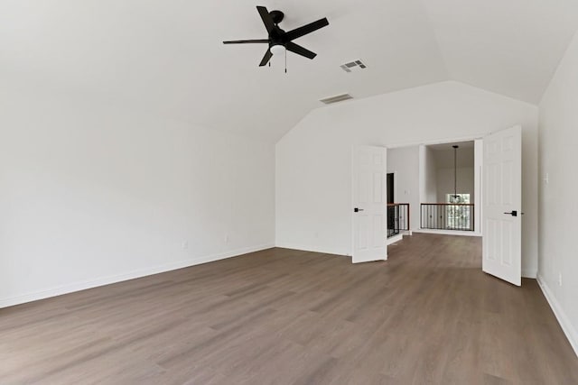 811 Zappa Dr, Cedar Park, TX 78613 - unfurnished living room with vaulted ceiling, ceiling fan, and dark wood-style flooring