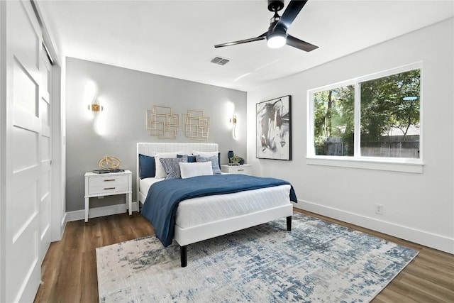 2400 Burly Oak Dr, Austin, TX 78745 - bedroom featuring wood finished floors and ceiling fan