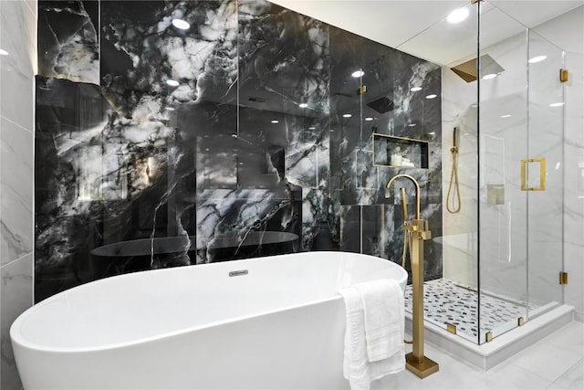2400 Burly Oak Dr, Austin, TX 78745 - bathroom with tile walls, a soaking tub, and a marble finish shower