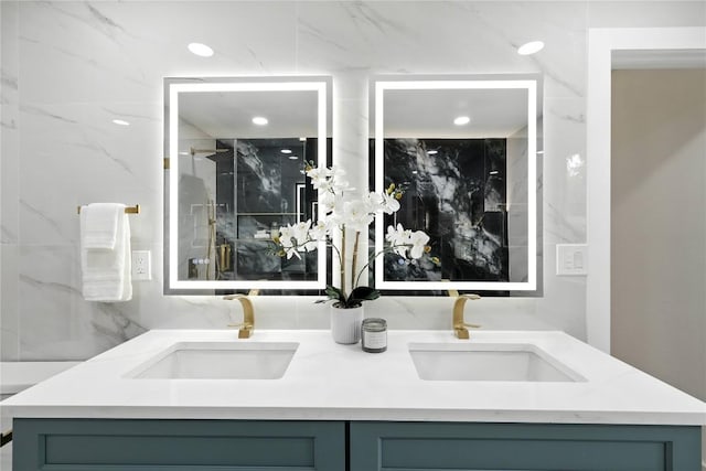 2400 Burly Oak Dr, Austin, TX 78745 - bathroom view of double vanity and a marble finish shower