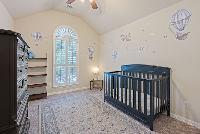 2634 Plantation Dr, Round Rock, TX 78681 - carpeted bedroom featuring lofted ceiling, a crib, and a ceiling fan