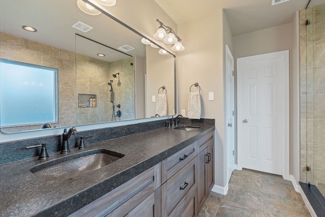 2634 Plantation Dr, Round Rock, TX 78681 - bathroom with a shower stall and double vanity