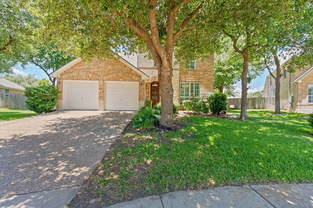 2634 Plantation Dr, Round Rock, TX 78681 - traditional-style home featuring a garage, brick siding, and driveway