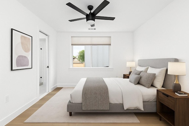 2813 Prado Unit 2, Austin, TX 78702 - bedroom with wood finished floors and a ceiling fan
