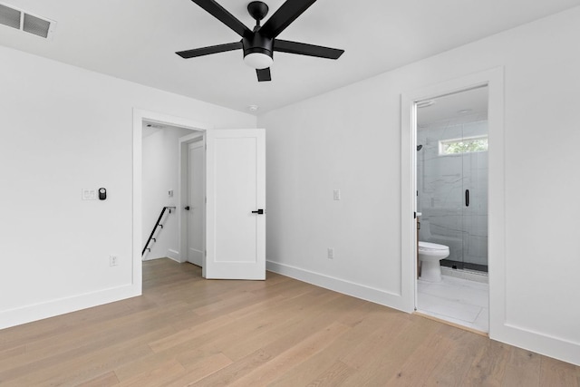 2813 Prado Unit 2, Austin, TX 78702 - unfurnished bedroom with light wood-style floors, ensuite bathroom, and ceiling fan