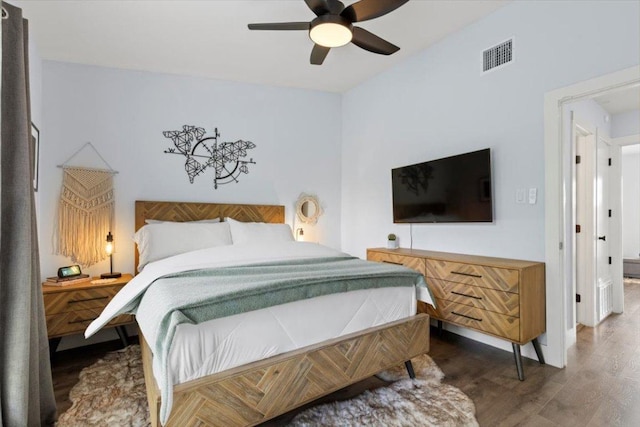 3812 Southway Dr Unit 103, Austin, TX 78704 - bedroom with wood finished floors and ceiling fan