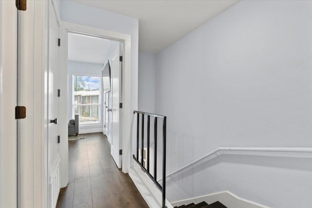 3812 Southway Dr Unit 103, Austin, TX 78704 - hall featuring an upstairs landing and dark wood finished floors