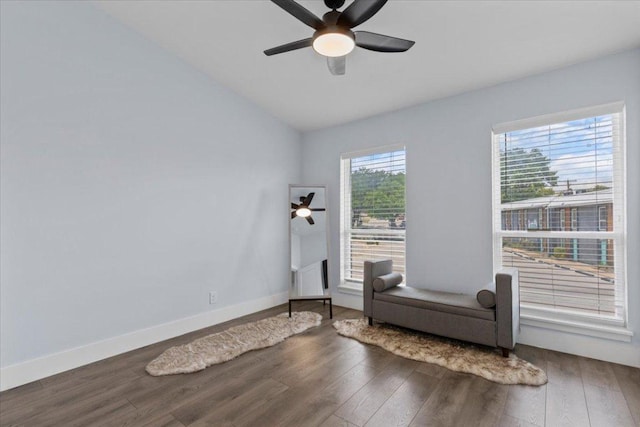 3812 Southway Dr Unit 103, Austin, TX 78704 - living area with ceiling fan, wood finished floors, and vaulted ceiling