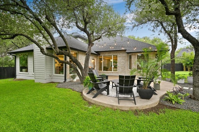 3703 Runnels Ct, Austin, TX 78732 - rear view of property with a patio area, roof with shingles, and brick siding