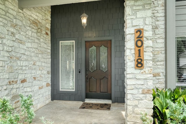 2018 Shadowbrook Cir, Round Rock, TX 78681 - view of exterior entry with stone siding
