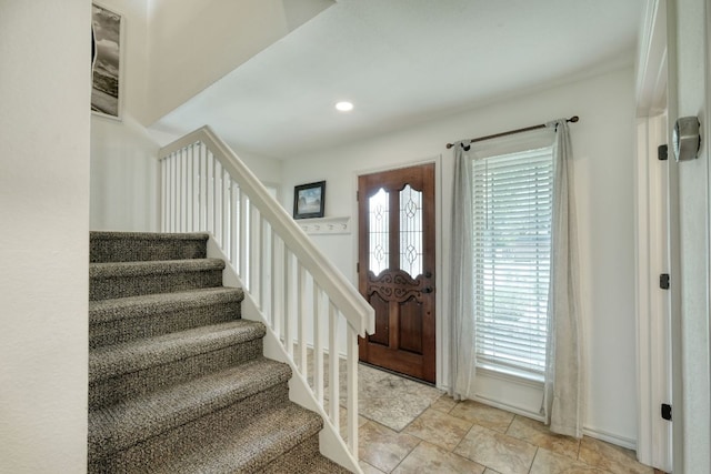 2018 Shadowbrook Cir, Round Rock, TX 78681 - foyer featuring stairs, recessed lighting, and light stone finish floors