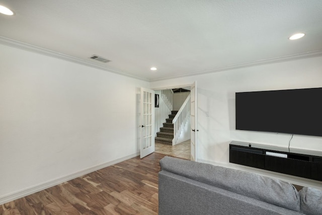 2018 Shadowbrook Cir, Round Rock, TX 78681 - living room featuring stairway, ornamental molding, wood finished floors, and recessed lighting