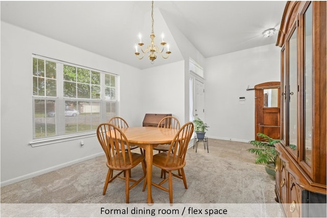 118 Lone Star Blvd, Hutto, TX 78634 - dining room featuring a chandelier and light colored carpet