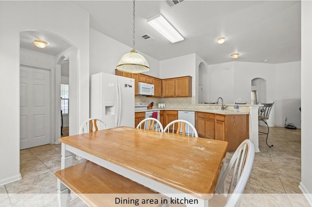 118 Lone Star Blvd, Hutto, TX 78634 - dining area with arched walkways