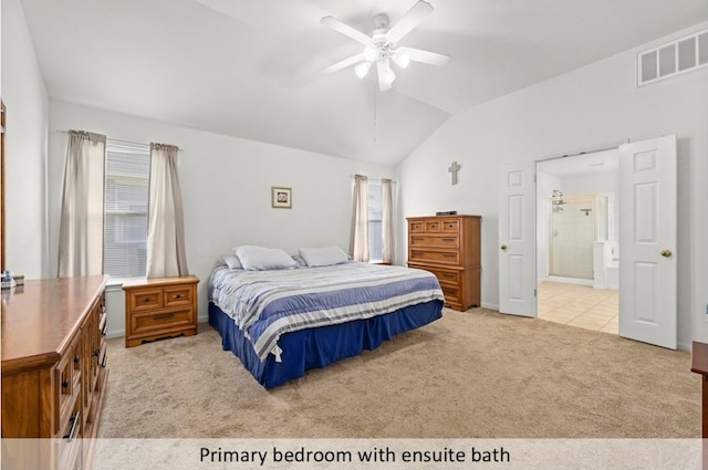 118 Lone Star Blvd, Hutto, TX 78634 - bedroom with lofted ceiling, light carpet, multiple windows, ensuite bathroom, and a ceiling fan
