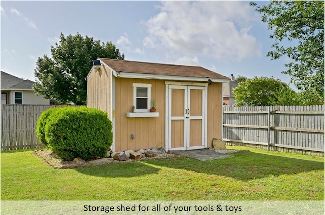 118 Lone Star Blvd, Hutto, TX 78634 - view of shed with a fenced backyard