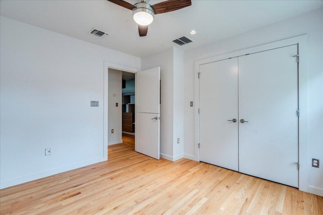 6602 Daugherty St, Austin, TX 78757 - unfurnished bedroom featuring wood finished floors, a closet, and a ceiling fan