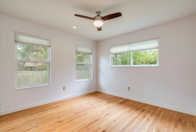 6602 Daugherty St, Austin, TX 78757 - empty room featuring light wood-type flooring and ceiling fan