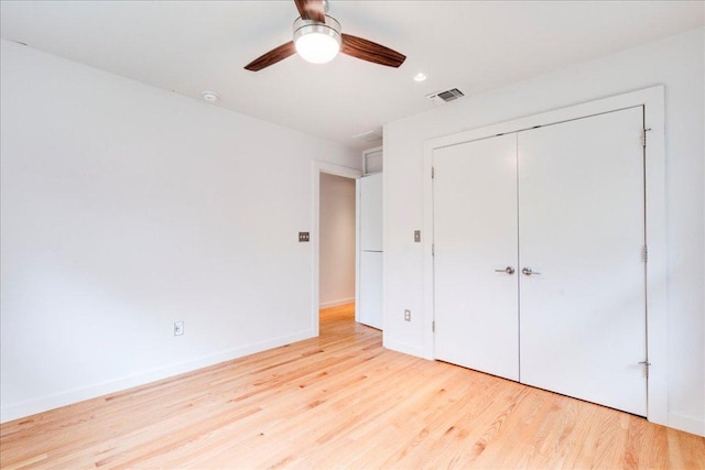 6602 Daugherty St, Austin, TX 78757 - unfurnished bedroom featuring light wood-style floors, a closet, ceiling fan, and recessed lighting