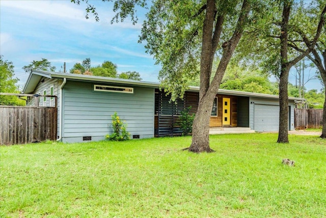 6602 Daugherty St, Austin, TX 78757 - view of front of house featuring crawl space, an attached garage, and driveway