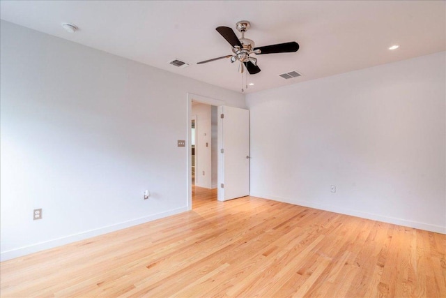 6602 Daugherty St, Austin, TX 78757 - unfurnished room with a ceiling fan, wood finished floors, and recessed lighting