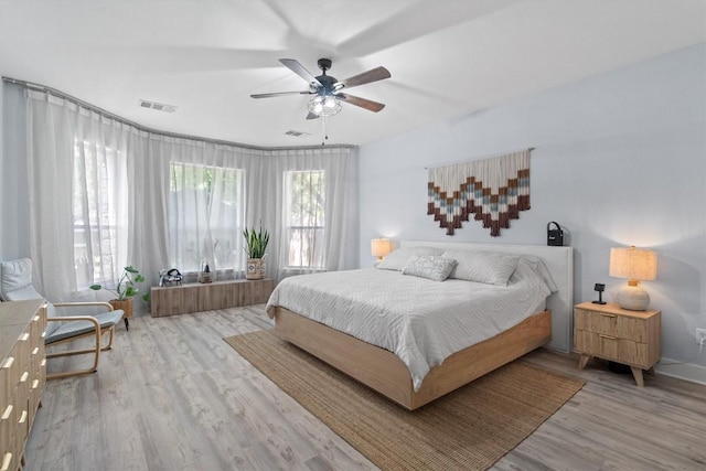 2108 Ariella Dr, Cedar Park, TX 78613 - bedroom with wood finished floors and a ceiling fan