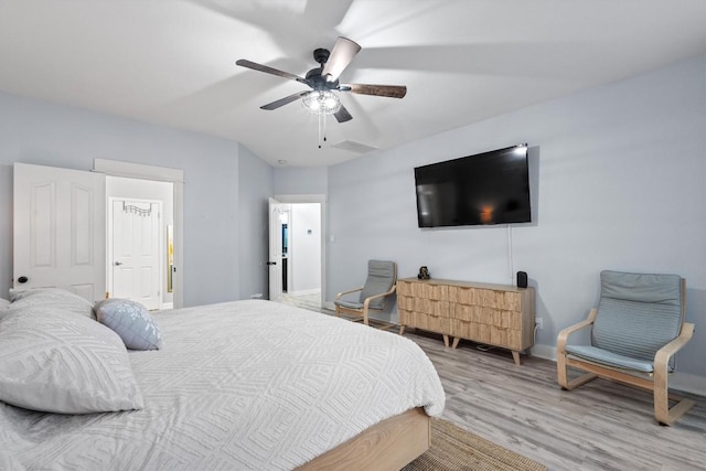 2108 Ariella Dr, Cedar Park, TX 78613 - bedroom featuring light wood-style flooring and a ceiling fan