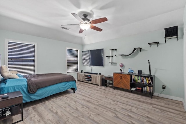 2108 Ariella Dr, Cedar Park, TX 78613 - bedroom with wood finished floors and ceiling fan