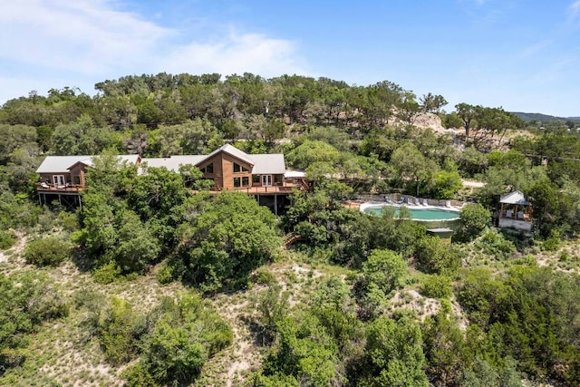 8152 Breeze Way, Jonestown, TX 78645 - view of subject property featuring a forest and a pool
