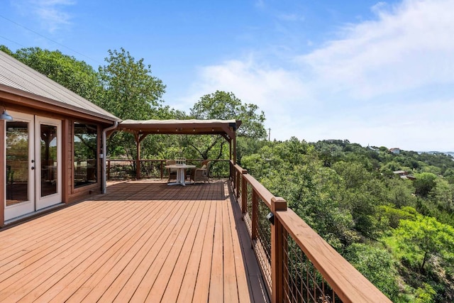 8152 Breeze Way, Jonestown, TX 78645 - wooden terrace with french doors