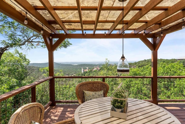8152 Breeze Way, Jonestown, TX 78645 - deck featuring a pergola, outdoor dining space, and a mountain view