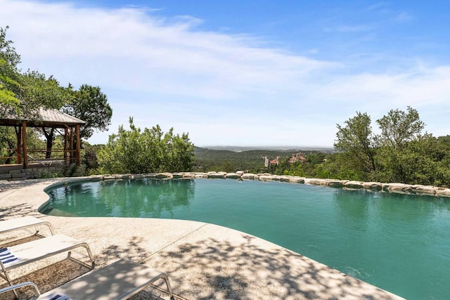8152 Breeze Way, Jonestown, TX 78645 - outdoor pool featuring a gazebo and a patio