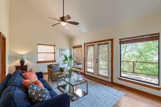 8152 Breeze Way, Jonestown, TX 78645 - living area with high vaulted ceiling, ceiling fan, wood finished floors, and french doors