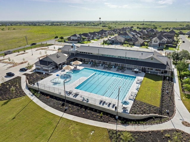 20209 Harrier Flight Trl, Pflugerville, TX 78660 - community pool featuring a residential view