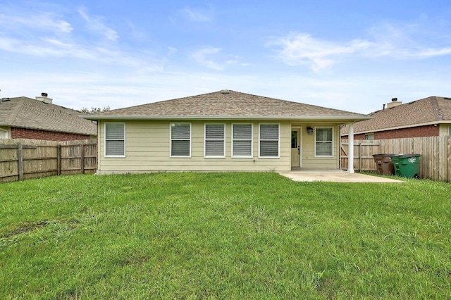 20209 Harrier Flight Trl, Pflugerville, TX 78660 - back of property with a patio area and a fenced backyard