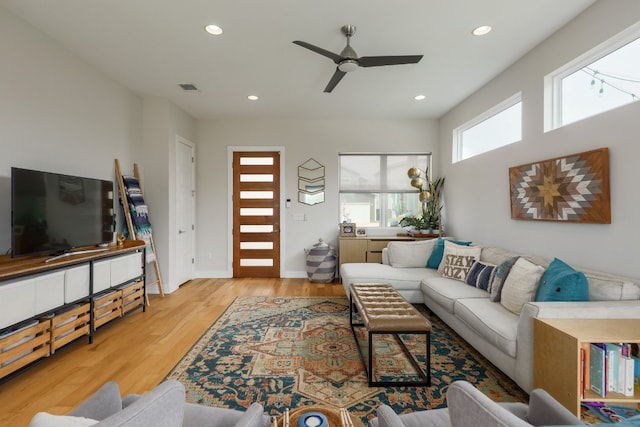 7013 Boyle Dr, Austin, TX 78724 - living area with a ceiling fan, recessed lighting, and wood finished floors