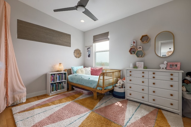 7013 Boyle Dr, Austin, TX 78724 - bedroom featuring wood finished floors, a ceiling fan, and recessed lighting