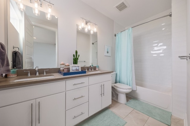7013 Boyle Dr, Austin, TX 78724 - full bath featuring double vanity, shower / bath combination with curtain, and tile patterned floors